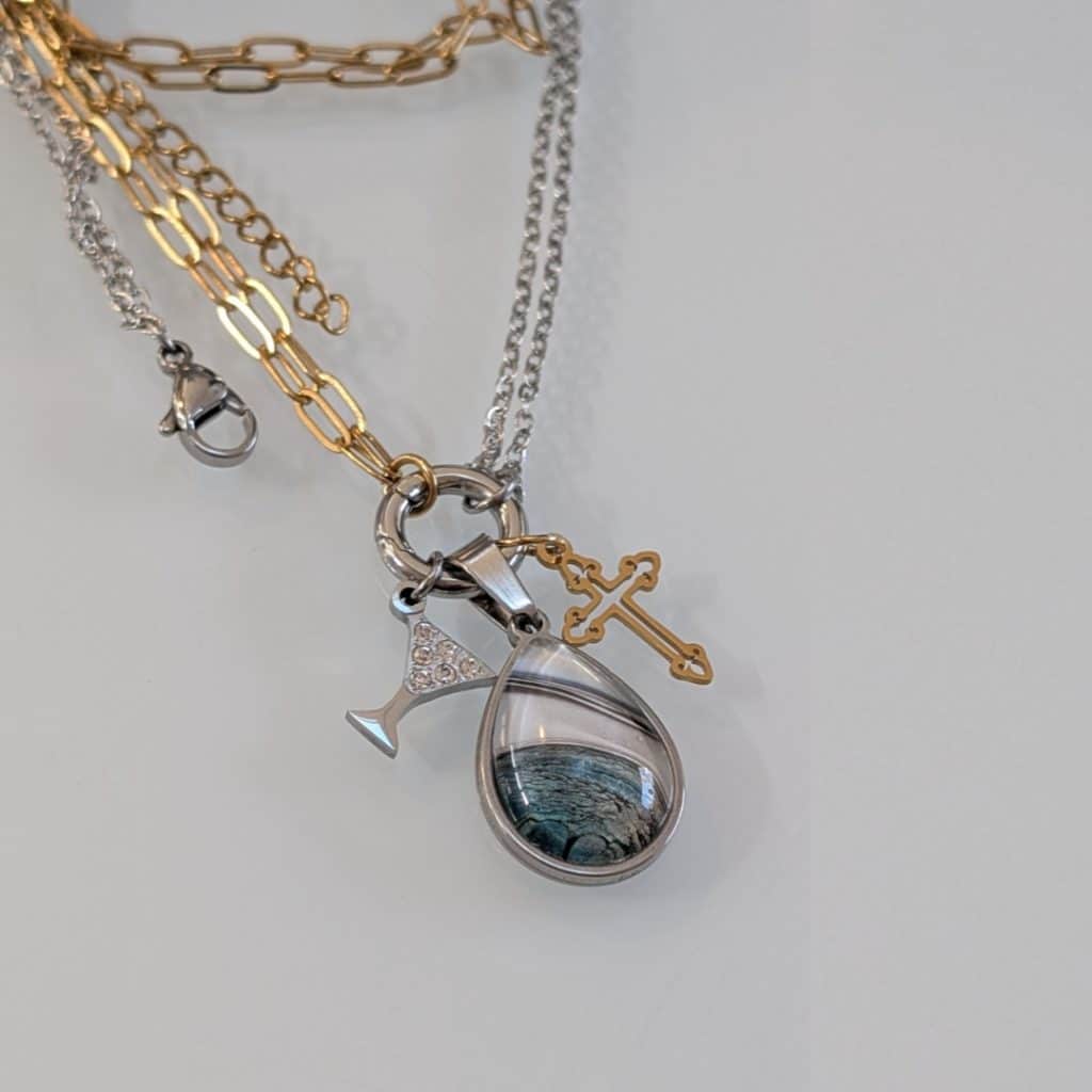 One of a kind abstract painted pendant on mixed metal chain in Kalamazoo.