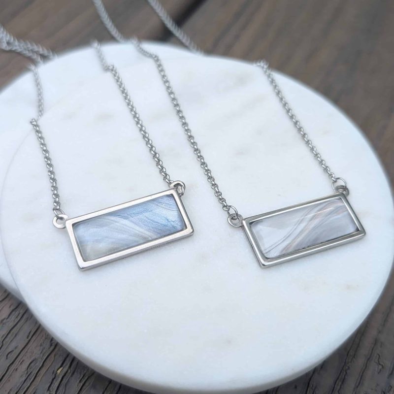 Abstract art pendants - horizontal pendant on stainless steel chain.